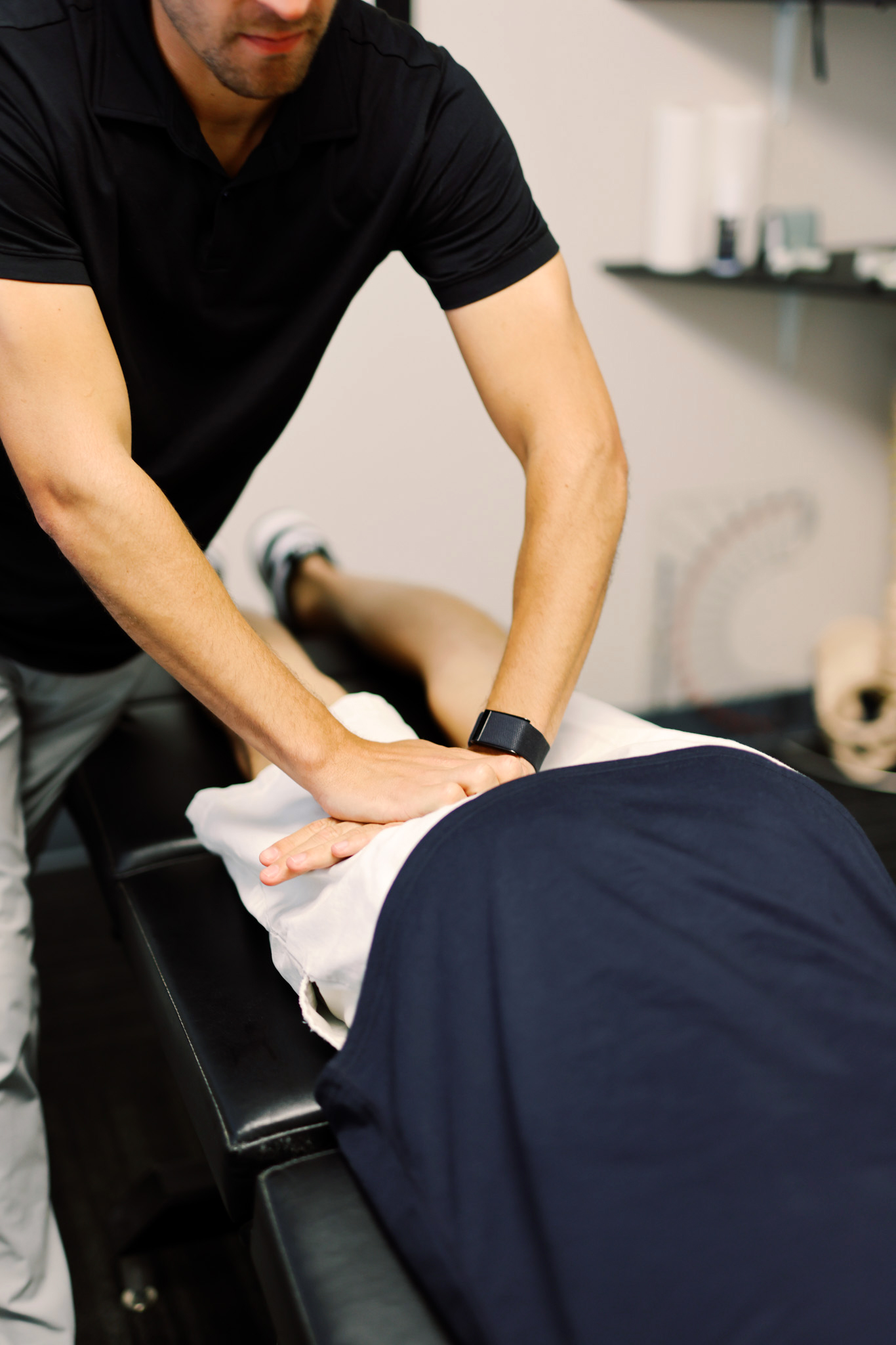 Chiropractor treating a patient