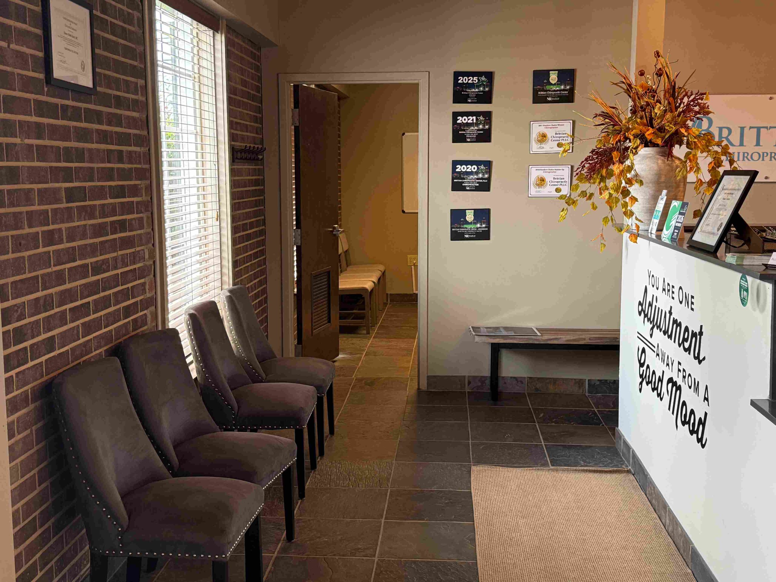 Chiropractor consulting with a patient